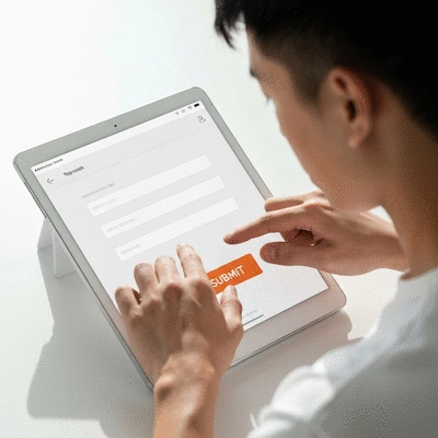 User submitting online form on tablet